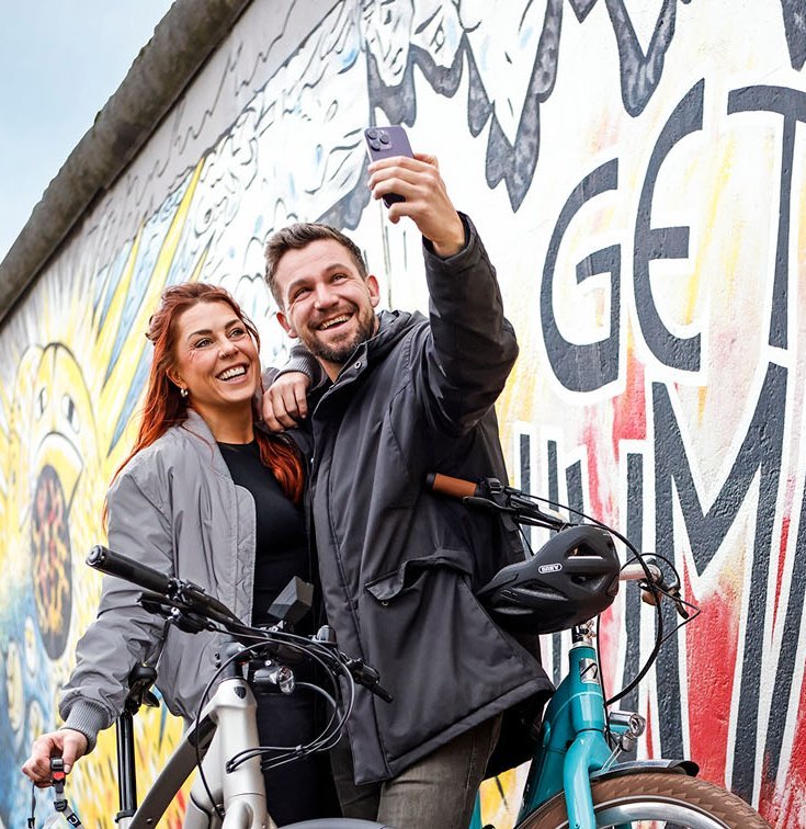 About Bikeleasing Employees taking a photo with new company bikes